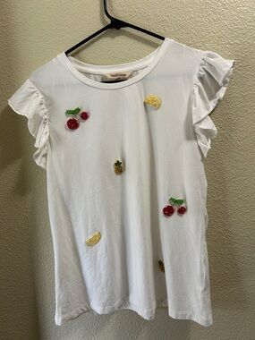 Mesh + Love ruffle-sleeve T-shirt featuring beaded fruit embellishments.